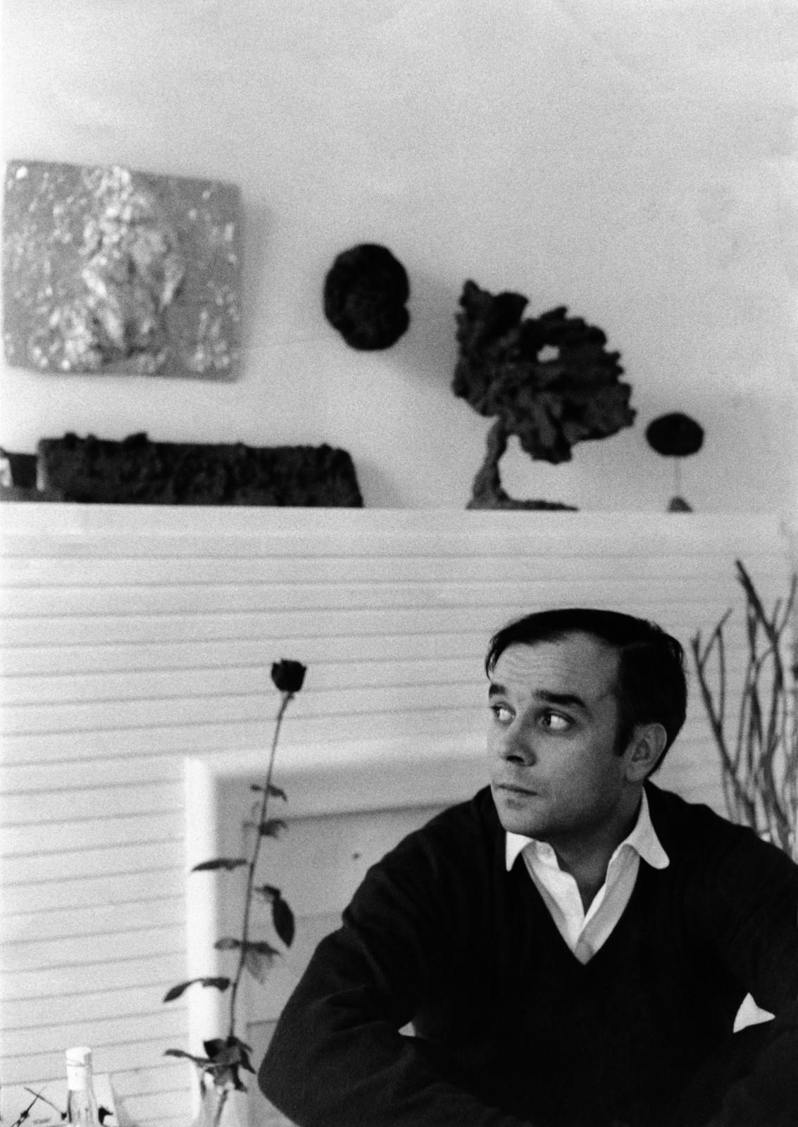 Yves Klein in his studio surrounded by his works (MG 5, RE 7, SE 33, SE 72)