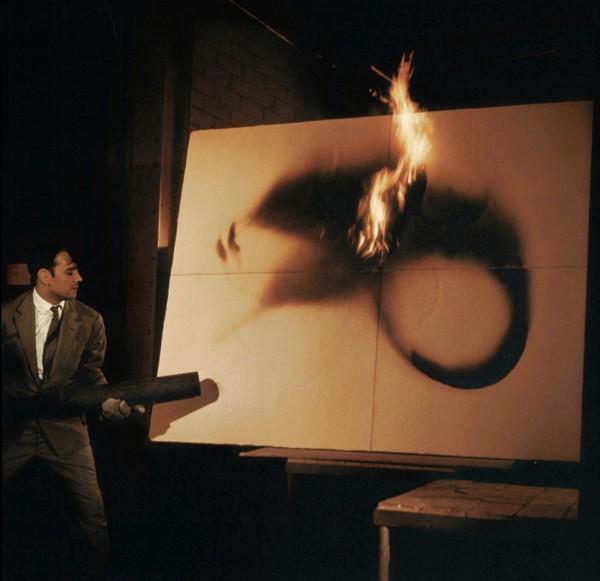 Yves Klein realizing a Fire Painting (F 25)