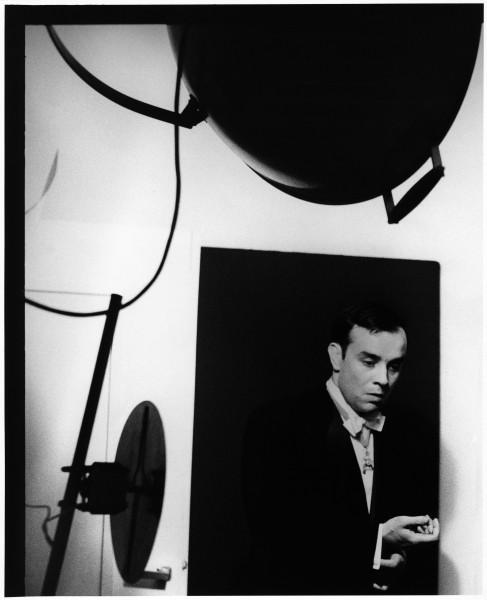 Portrait of Yves Klein in his studio