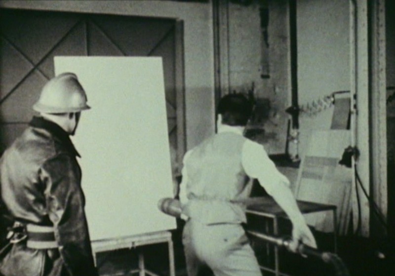 Yves Klein creating Fire Paintings