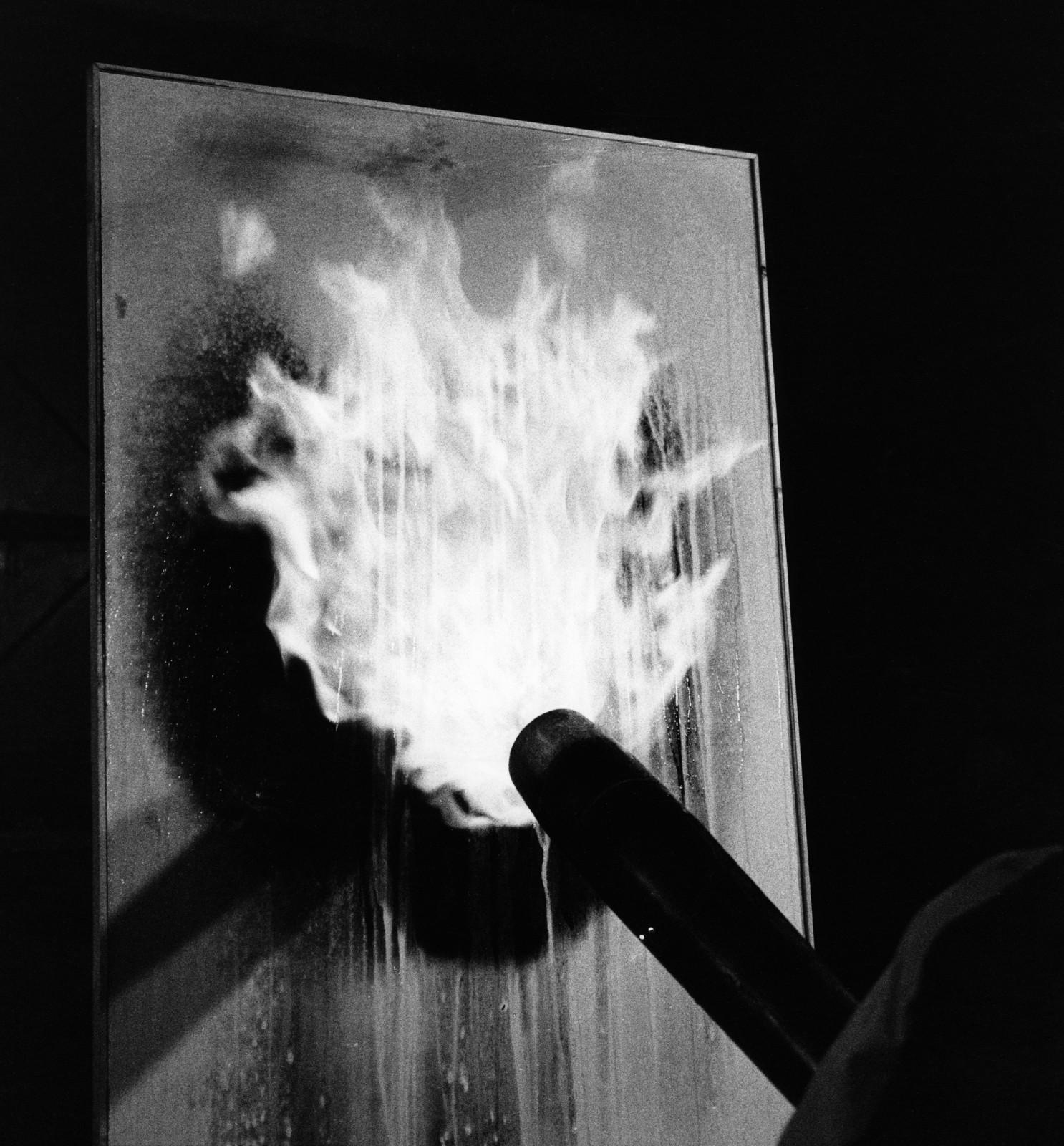 Yves Klein realizing a Fire Painting (F 124)