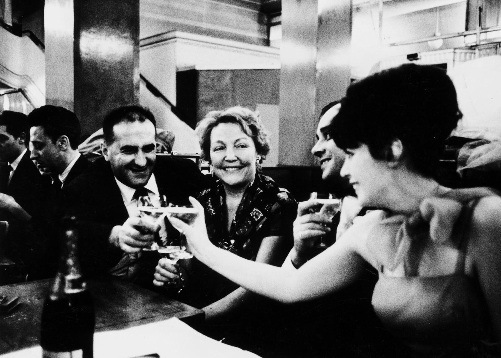 Raymond Hains toasts with Rotraut and Yves Klein on their wedding evening