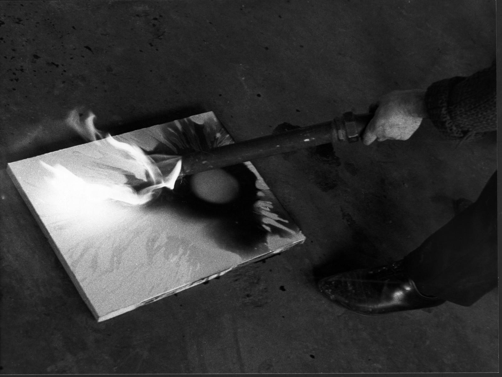 Yves Klein realizing a Fire Painting (F 67)