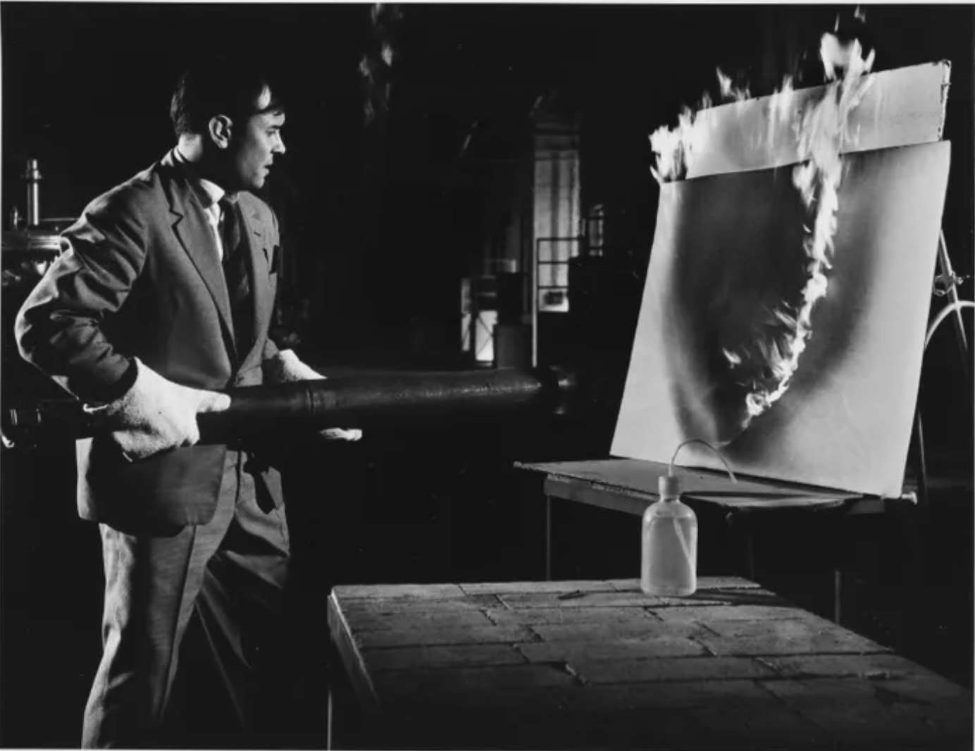 Yves Klein making a Fire Painting