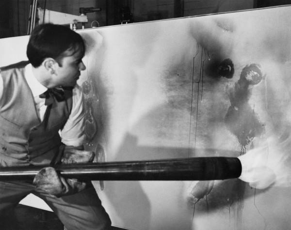 Yves Klein realizing a Fire Painting (F 88)