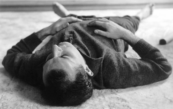 Arman lying in Yves Klein's studio