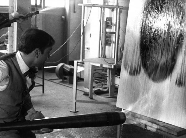 Yves Klein realizing a Fire Painting (F 2)