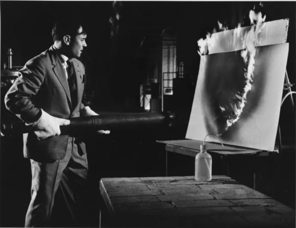 Yves Klein making a Fire Painting