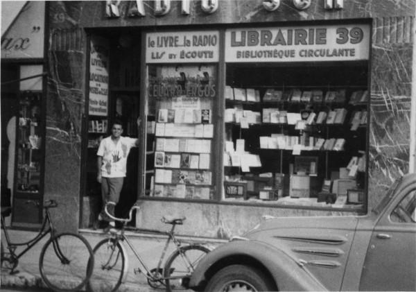 Yves Klein in front of the bookshop of his aunt Rose Raymond in Nice