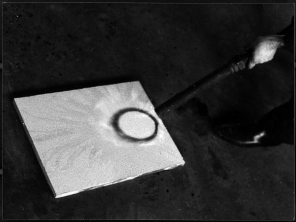 Yves Klein realizing a Fire Painting (F 67)