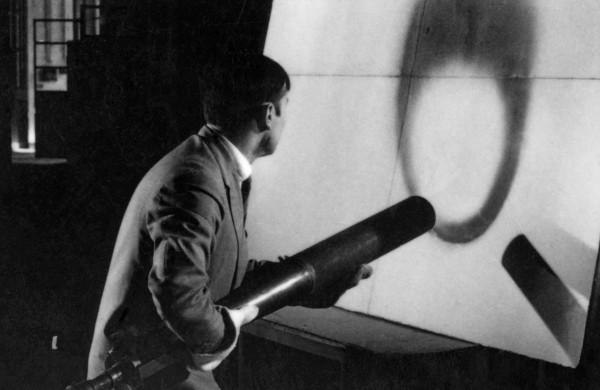 Yves Klein realizing a Fire Painting (F 25)