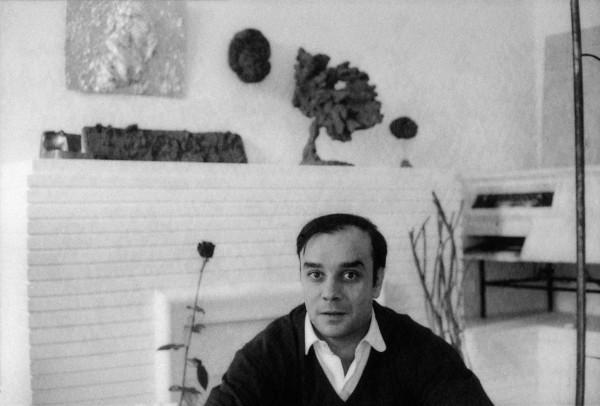 Yves Klein in his studio with his works (MG 5, RE 7, SE 33, SE 72)